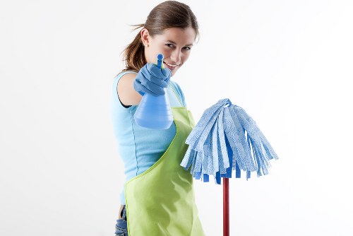 Carpet cleaning technician preparing equipment safely before a cleaning job