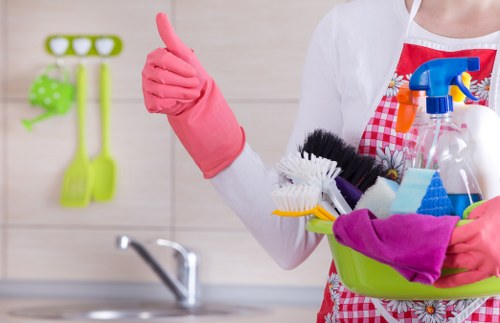 Cleaning technician reviewing carpet cleaning booking details and access notes