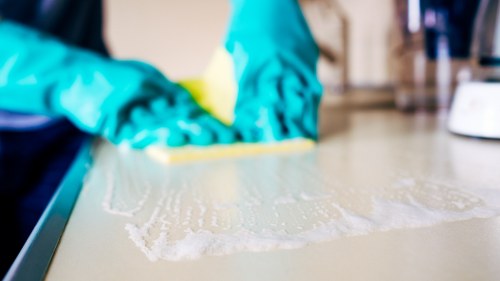 Carpet cleaners removing dirt and stains from a busy floor in Bow