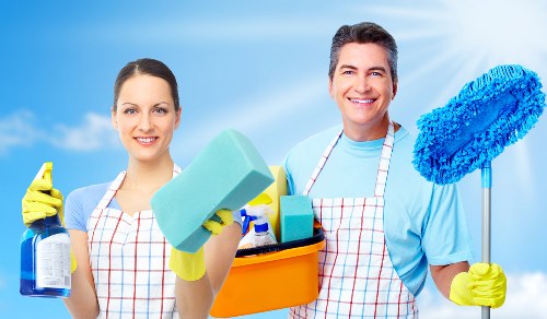 Cleaner preparing a modern apartment in Bow for a domestic clean